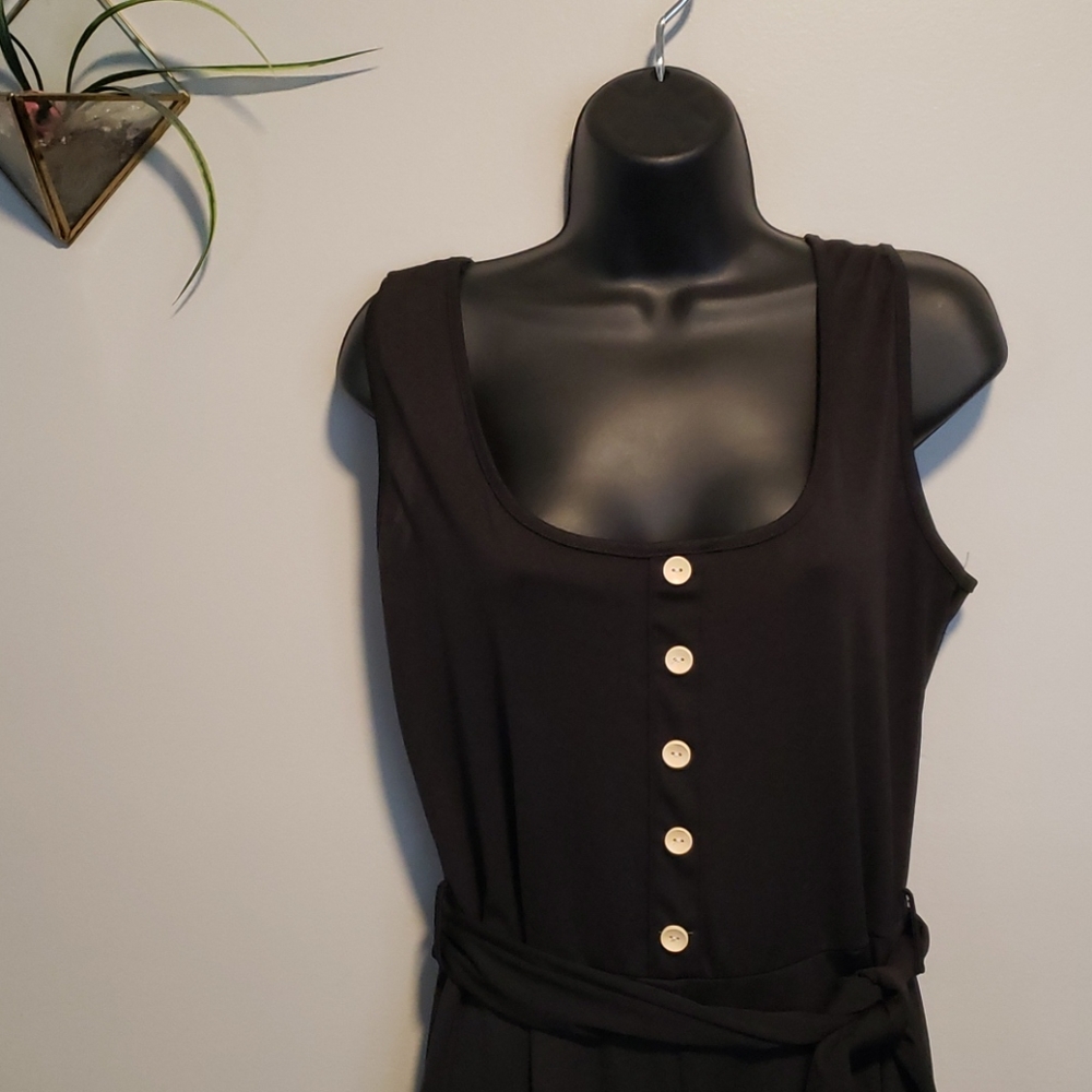 Black jumpsuit with tie belt.